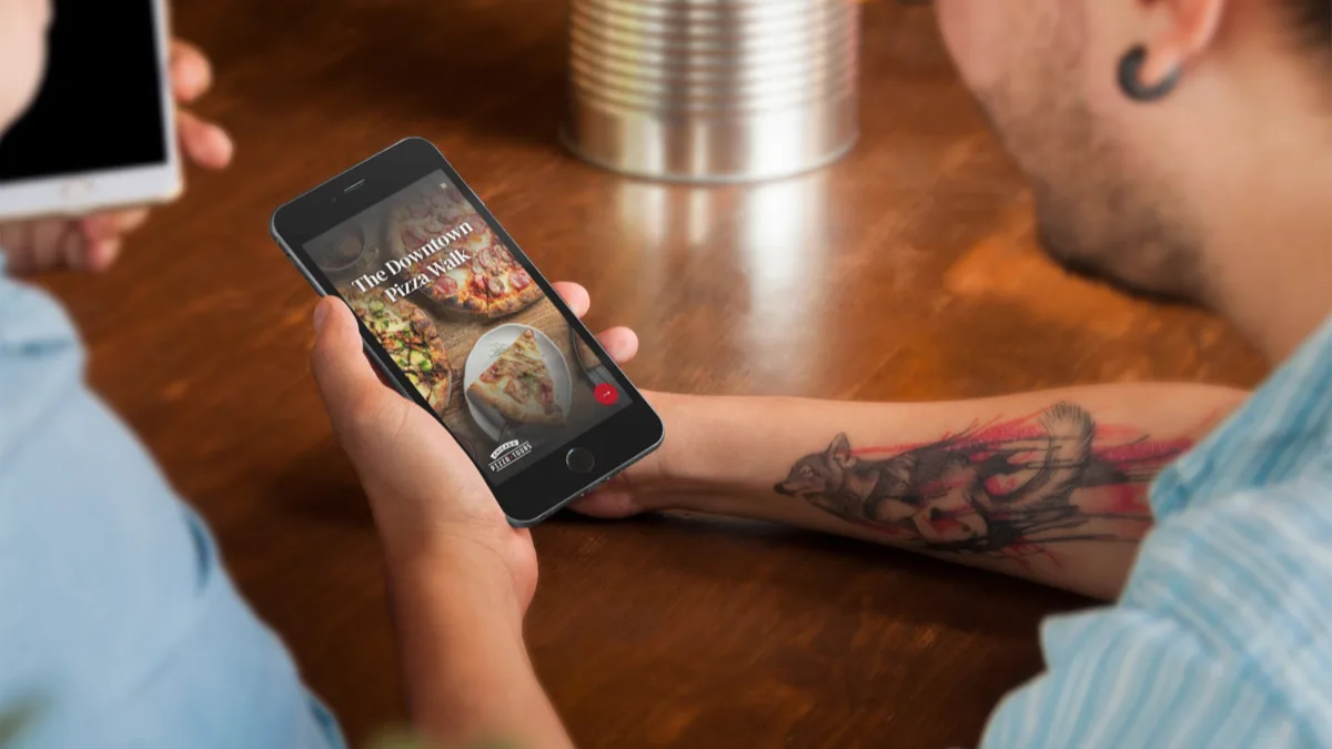 Digital guidebook displayed on a smartphone for tour operators